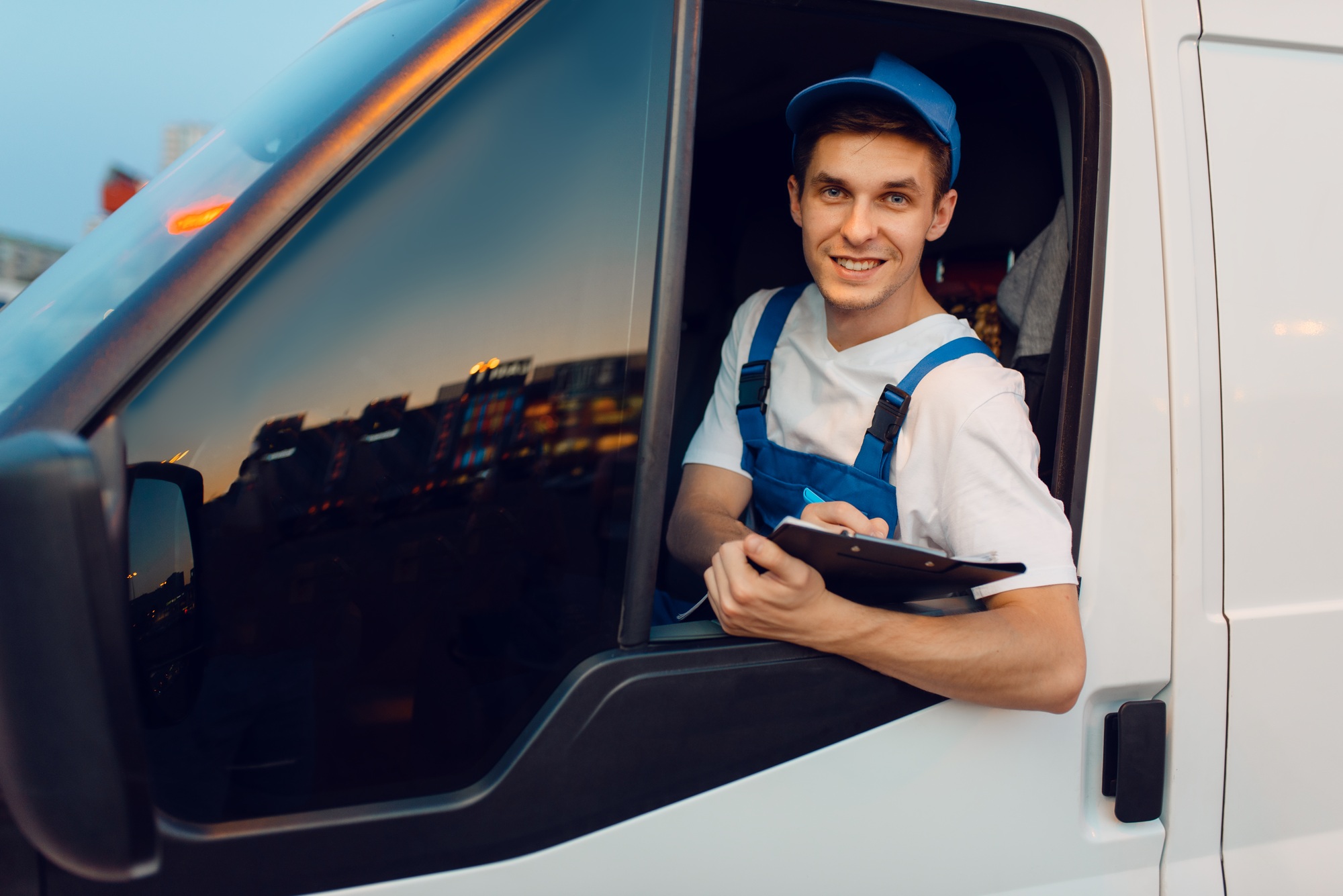 Deliveryman drives a car, delivery service