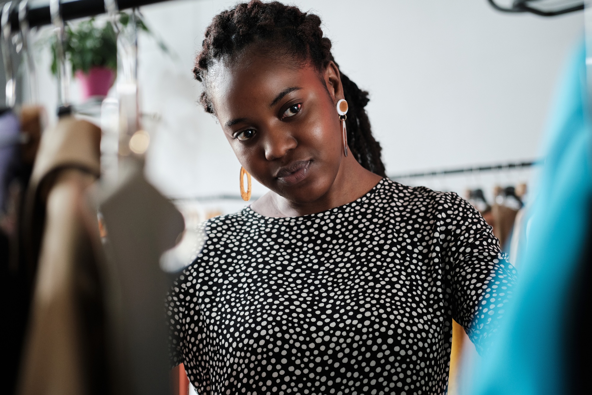 Woman buying new clothes